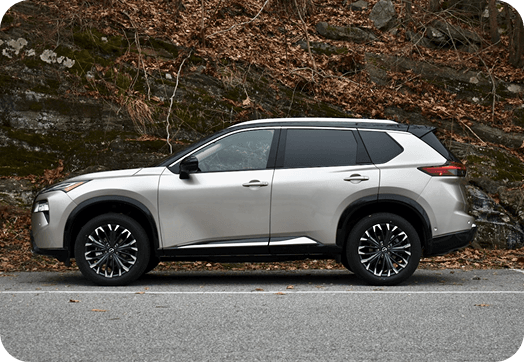 White SUV in a forest setting